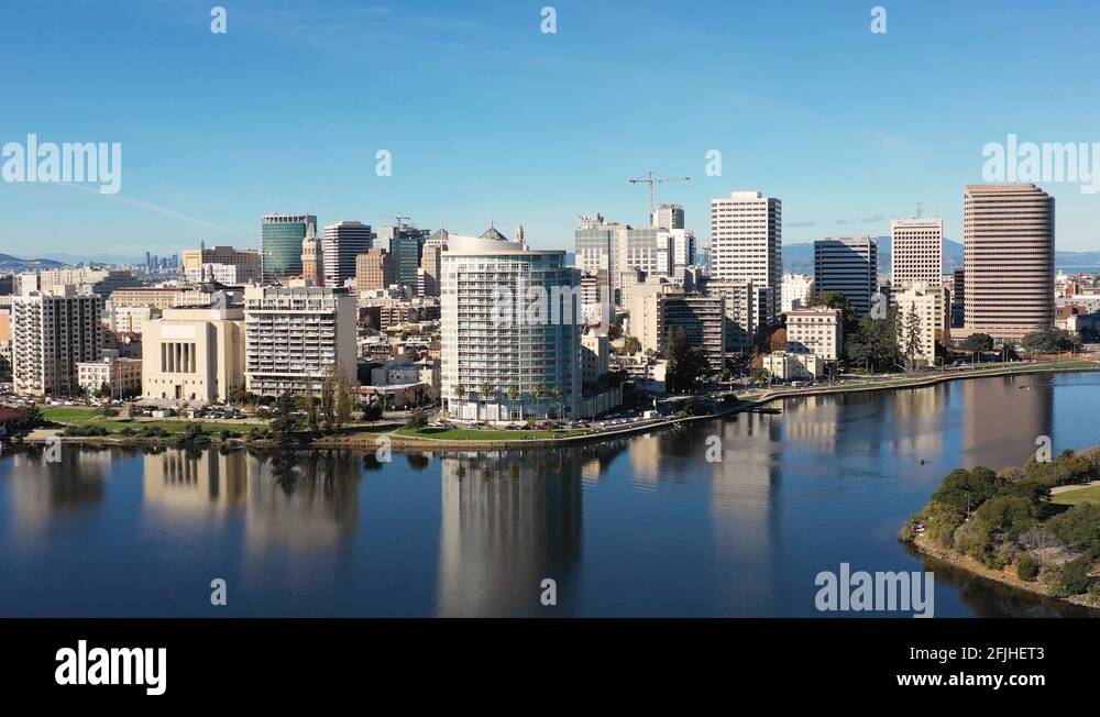 Downtown Oakland Skyline Reflecting on Lake Merritt Stock Video Footage ...