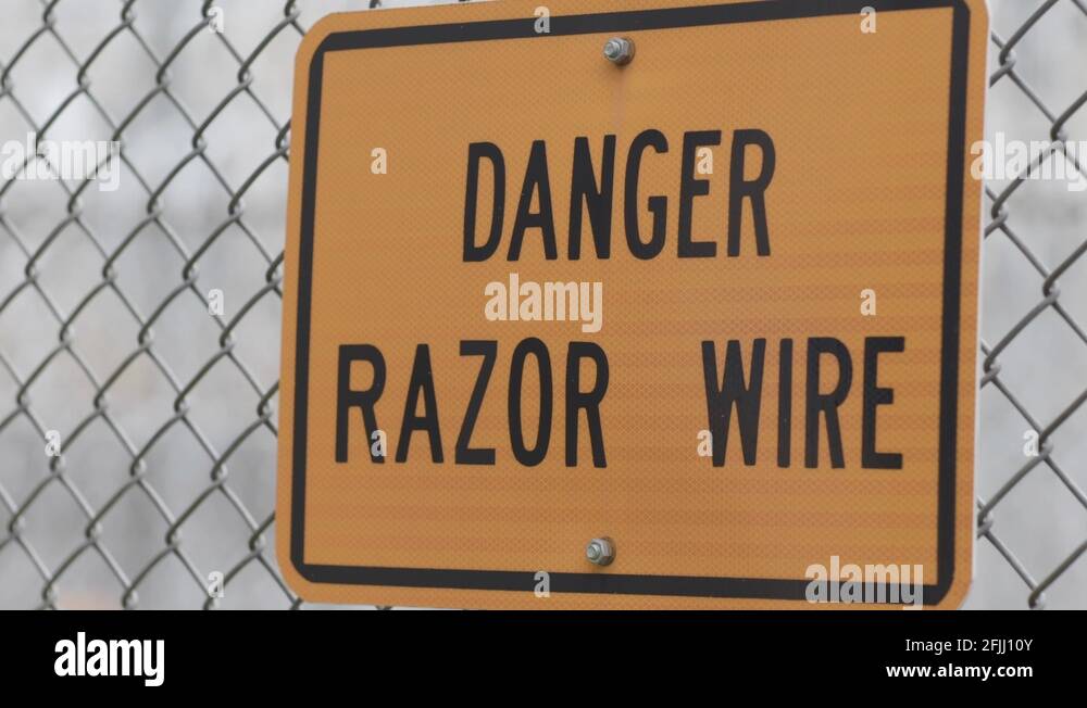 Danger razor wire sign Stock Videos & Footage HD and 4K Video Clips