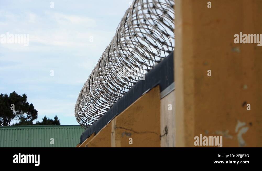 Razor wire wall Stock Videos & Footage - HD and 4K Video Clips - Alamy