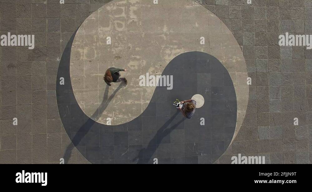 Yin and Yang Symbol Top Down Spinning Shot Rising Vertically Stock