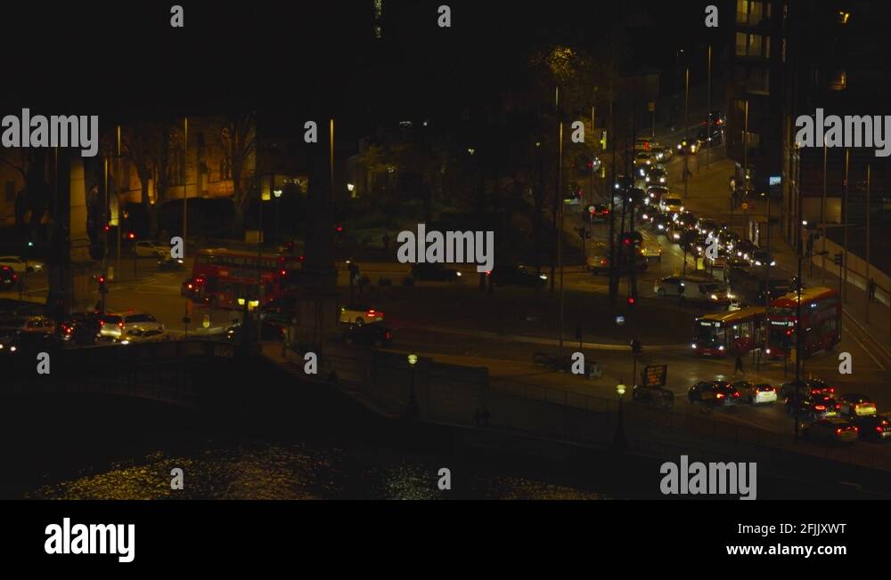 London rush hours traffic at Lambeth roundabout during night time Stock