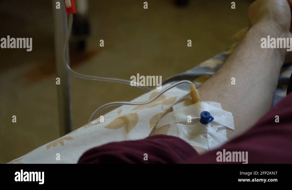 Intravenous injection. Infusion of the drug into a vein through an IV ...