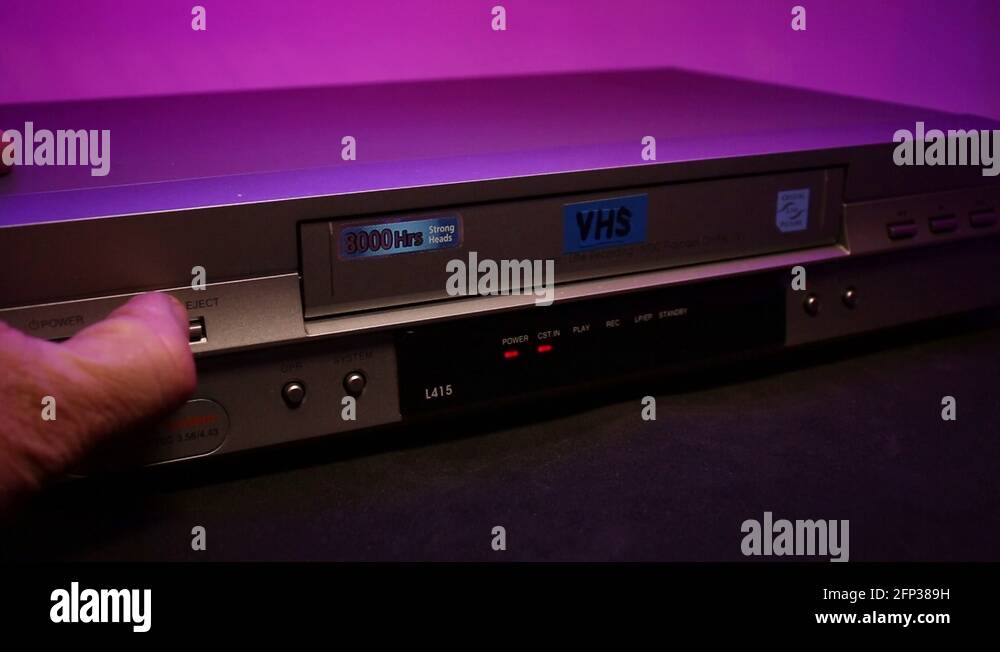 Ejecting London VHS Video Tape Out Of A VCR Player Stock Video Footage