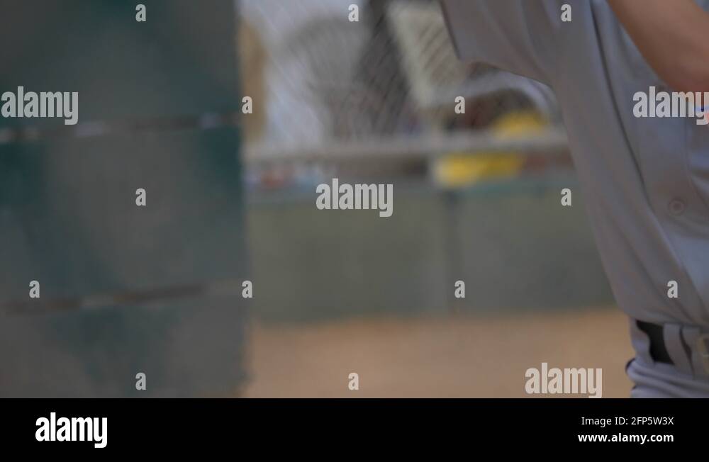 Boys playing little league baseball game, batter gets base hit, slow