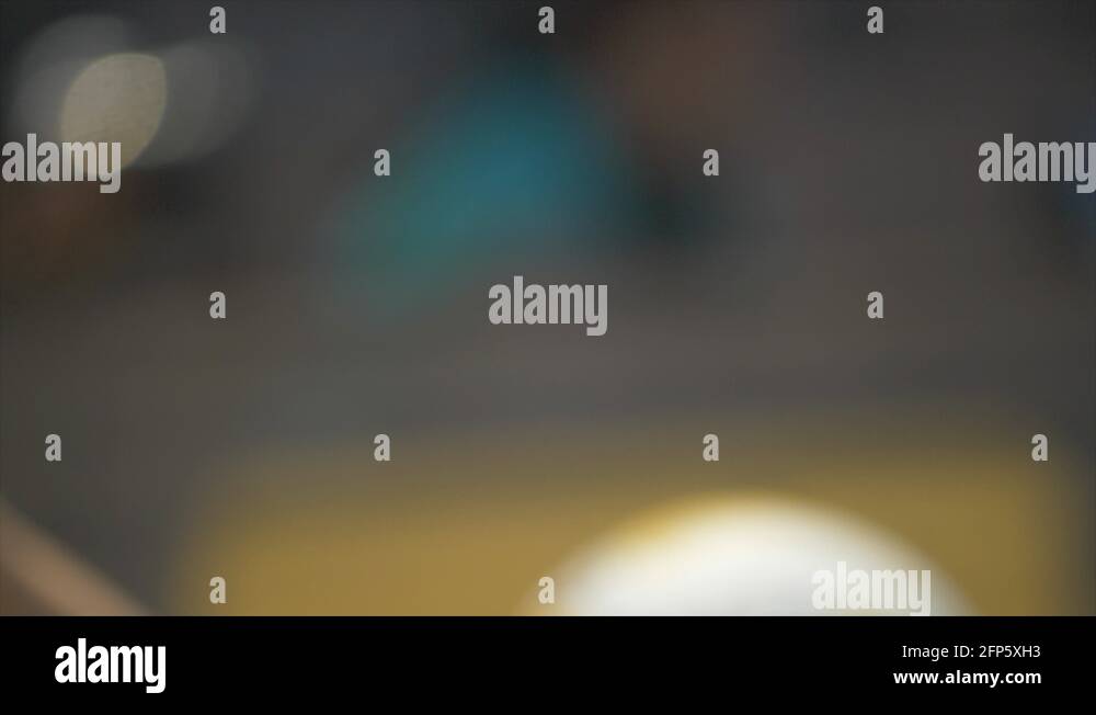 Women serve serving while playing pro beach volleyball in the sand