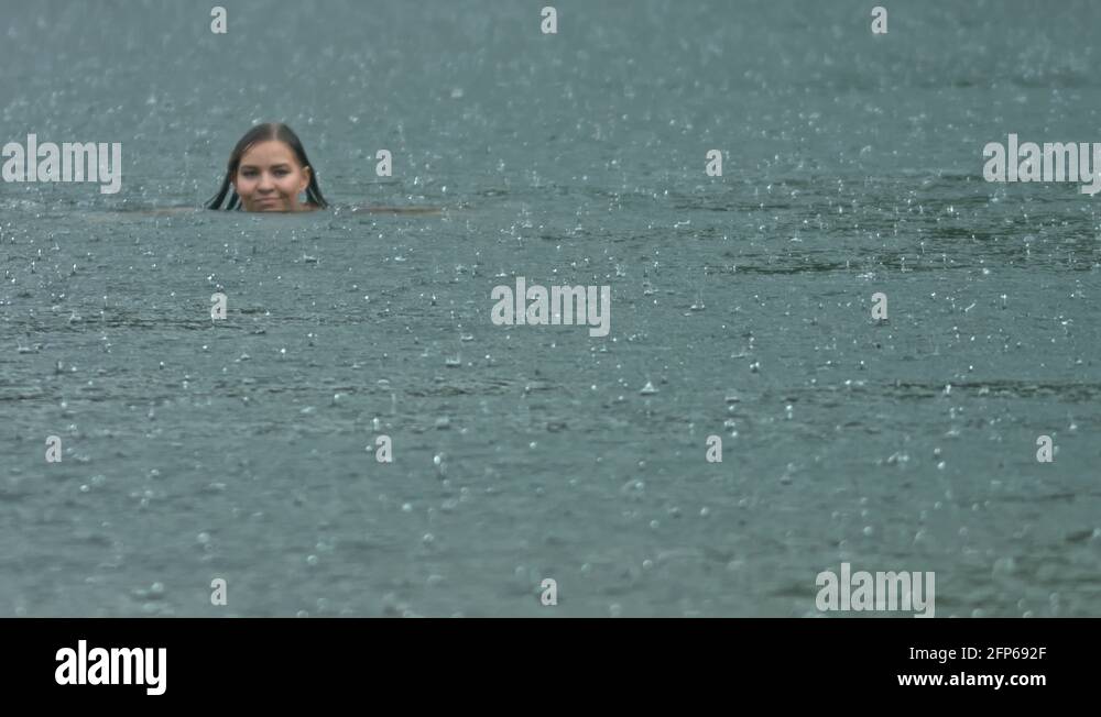 Female swimming in the rain at sea Stock Videos & Footage HD and 4K Video Clips Alamy