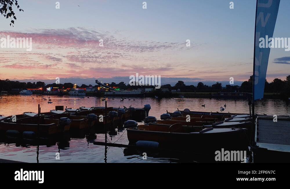 Slow Motion Shot Into The Horizon Featuring A Boat Rental Harbor With