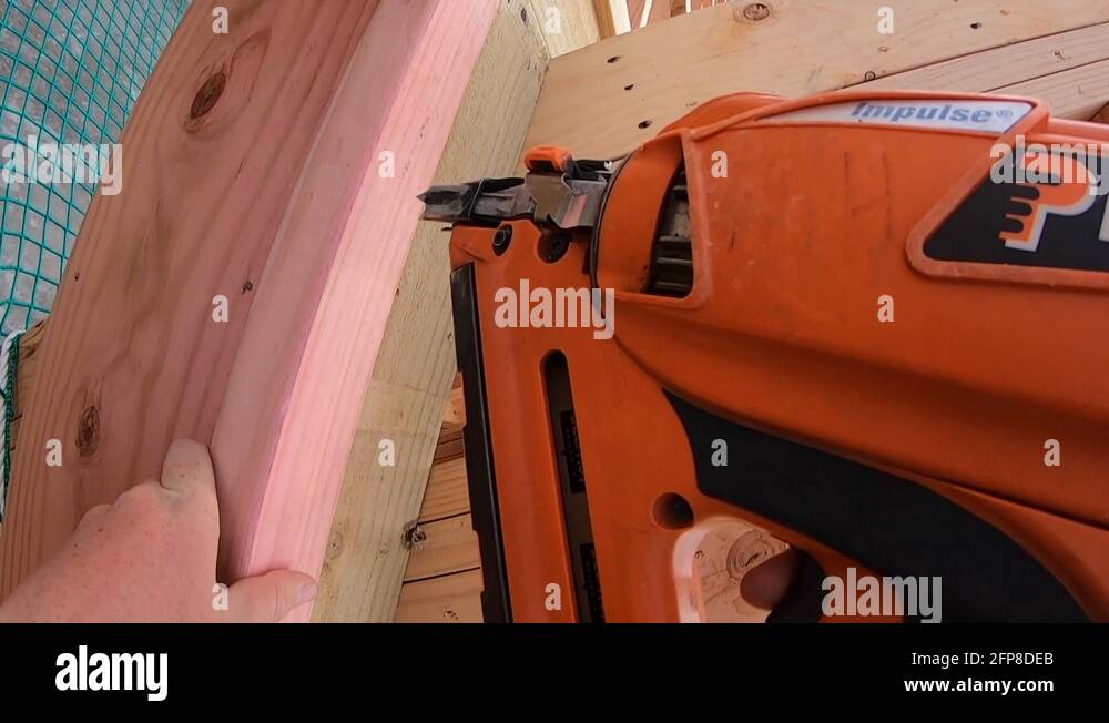 Carpenter nail gun construction site Stock Videos & Footage HD and 4K