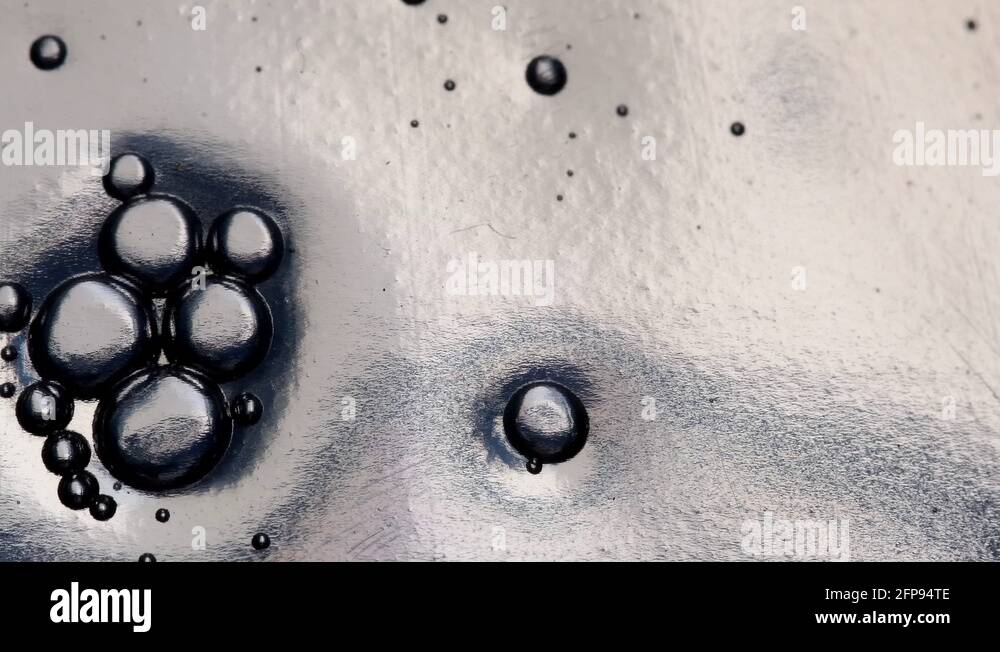 Bubbles go down inside a detergent bottle Stock Video Footage Alamy