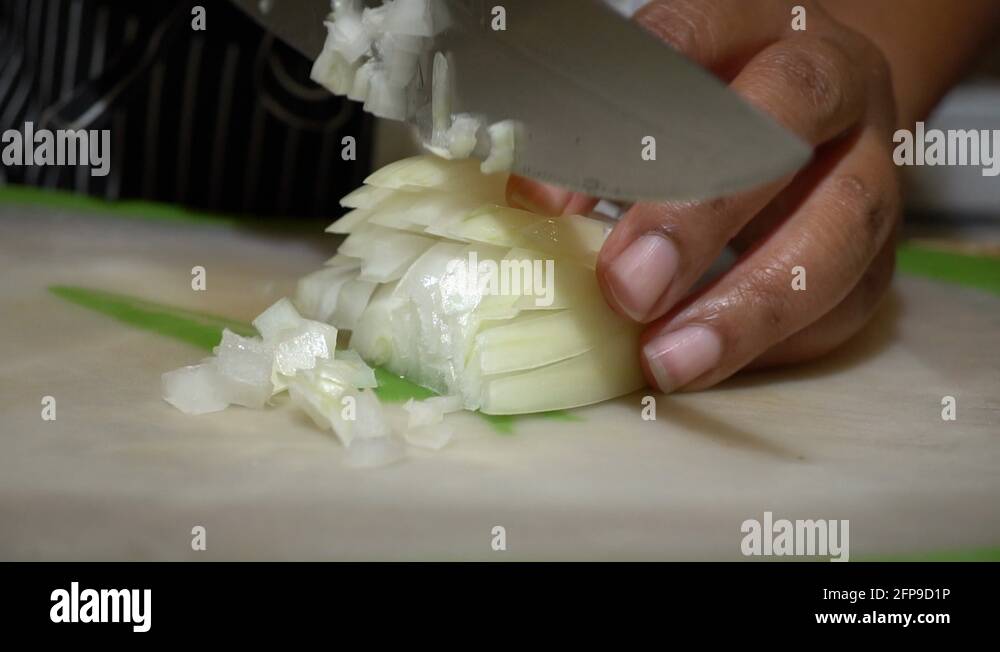 Woman chopping onion Stock Videos & Footage - HD and 4K Video Clips - Alamy