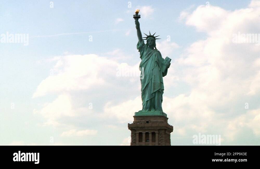 The majestic Statue of Liberty holding her torch and tabula ansata with