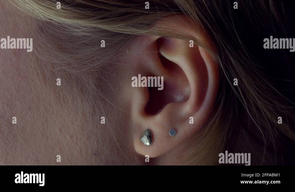 Earlobe Piercing Stock Videos Footage Hd And K Video Clips Alamy