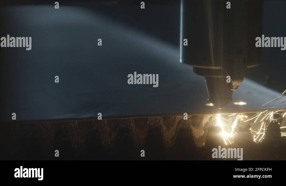 Sparks glow and fly as a power tool cuts and shapes metal Stock Video Footage Alamy