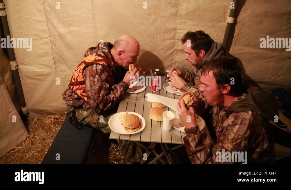 Hunters eating Stock Videos & Footage HD and 4K Video Clips Alamy