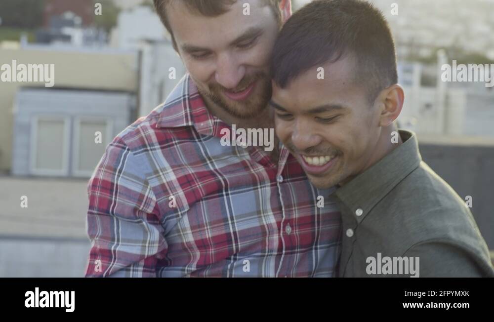 Cute Gay Couple Pose For Selfie With A Kiss On The Cheek, Shot In 4K