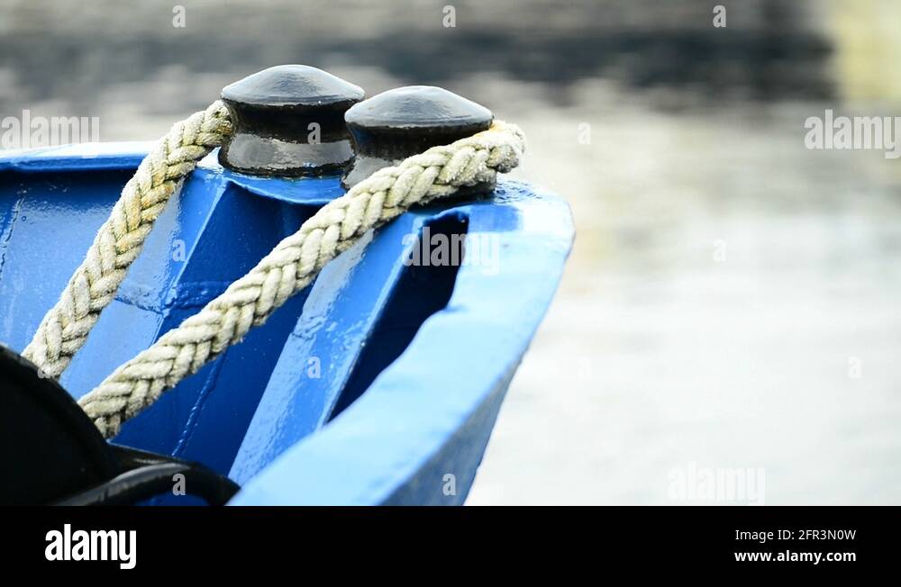 Ship bow with mooring lines in an harbor Stock Video Footage Alamy