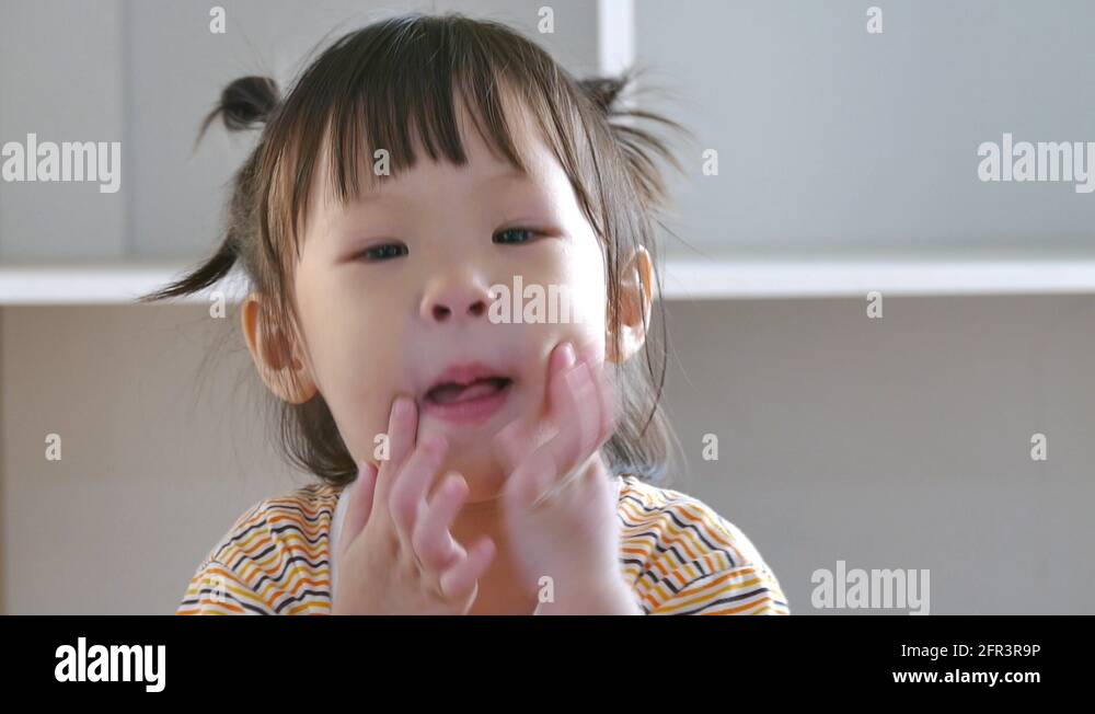 Little Girl Makes A Funny Face Stock Video Footage Alamy