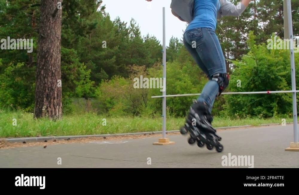 Rollerblade rollerblading jump trick Stock Videos & Footage HD and 4K