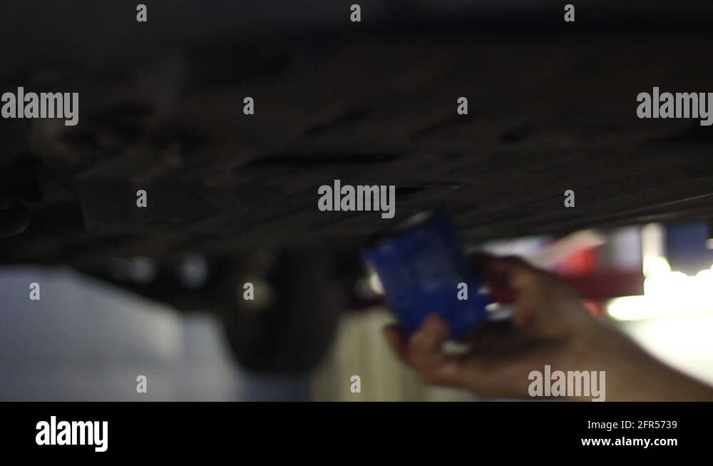 Changing oil filter Stock Videos & Footage HD and 4K Video Clips Alamy