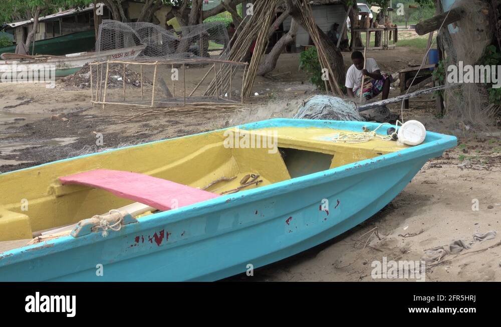 Jamaica coastal village fishing boat trap making 4K Stock Video Footage