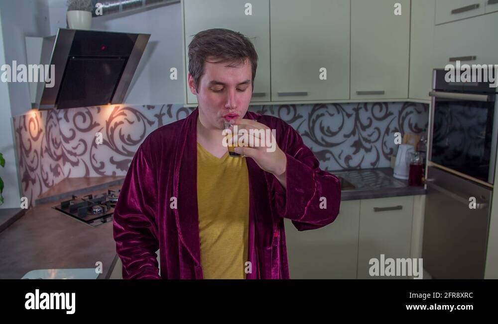 Giving the thumbs up after drinking orange juice Stock Video Footage