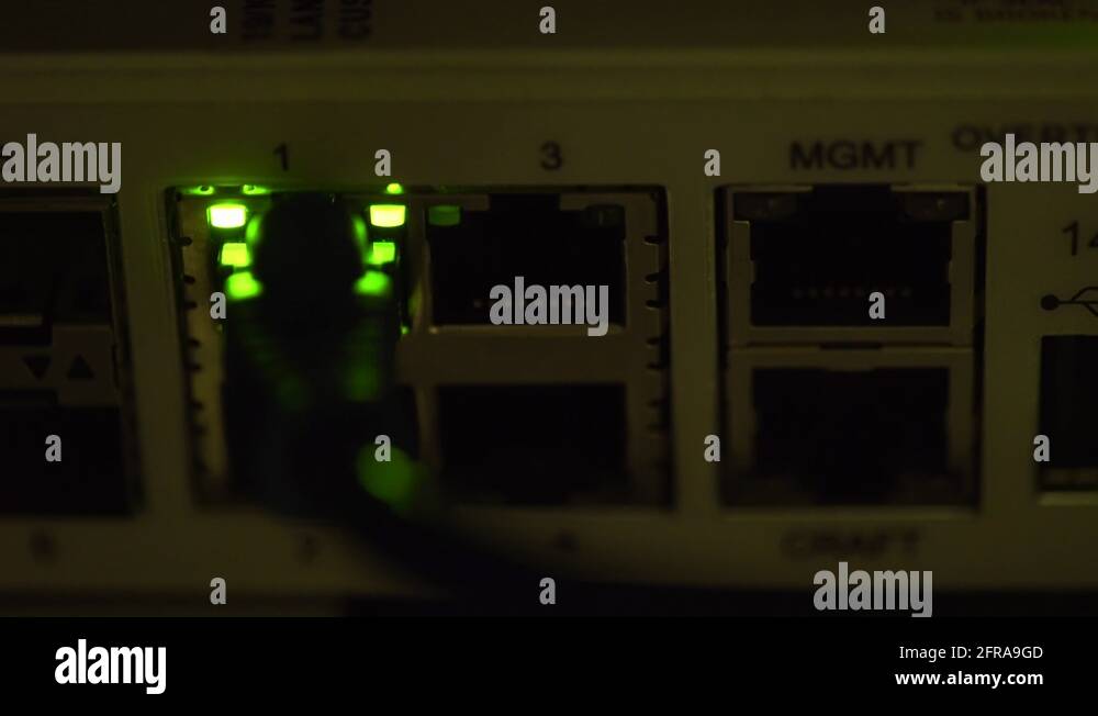 switch traffic light blinking in a dimly lit server room 4k