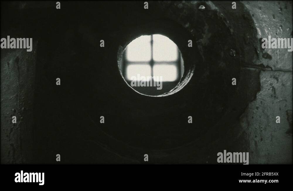 Round hole in jail door Stock Video Footage Alamy