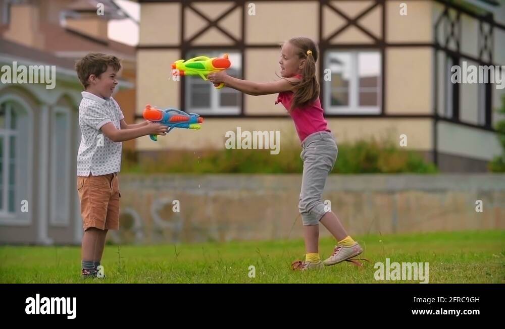 Water Gun Battle Stock Video Footage Alamy