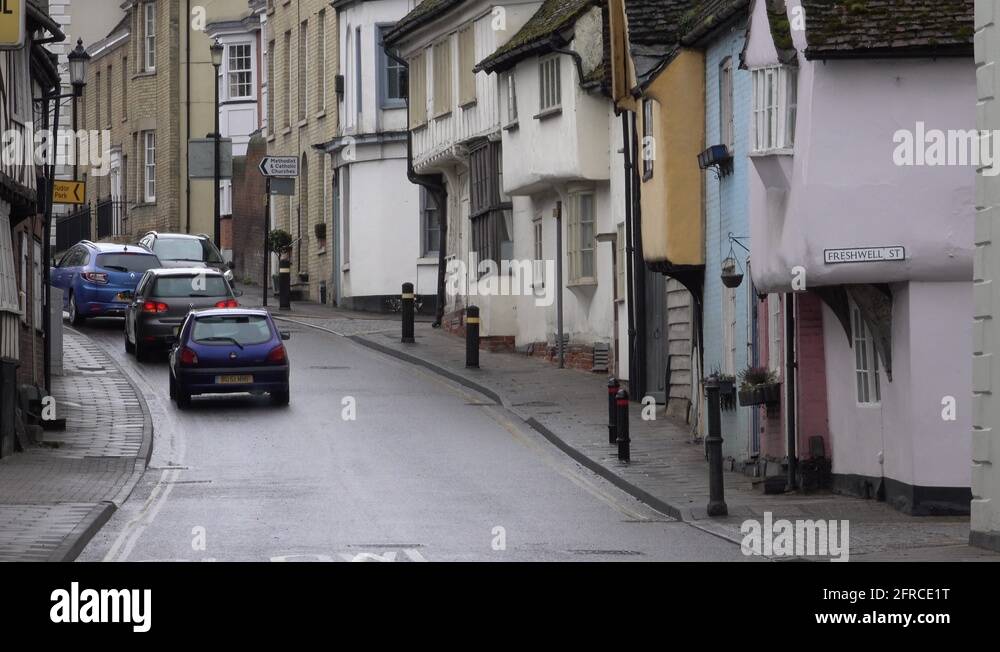 Traffic cars historic street Saffron Walden England 4K Stock Video