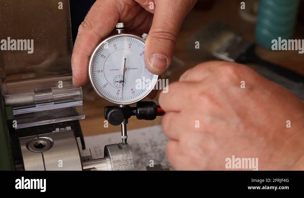 man using micrometer clock precision comparator dial test indicator Stock Video Footage Alamy