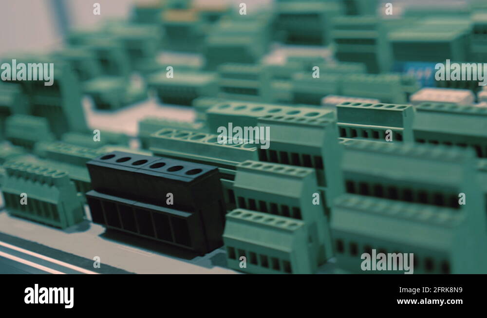 Rows of plastic electrical terminals for connection of wires of green color Stock Video Footage