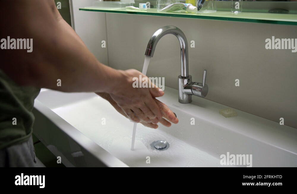 Man Washing The Hands In Toilet Tap Stock Video Footage Alamy