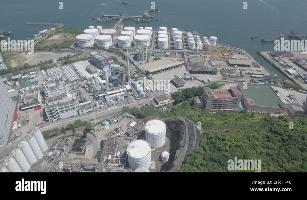 Flying towards oil storage tanks of a petrochemical facility in Hong