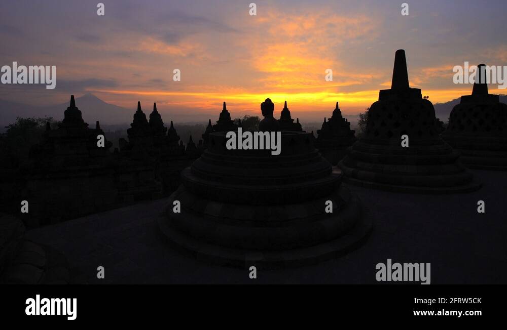 Sunrise view Mt Merapi and Borobudur religious temple Java South East ...