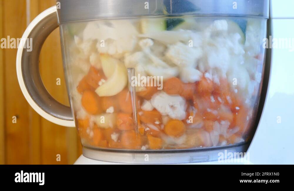 Blending vegetables in blender, close up Stock Video Footage Alamy