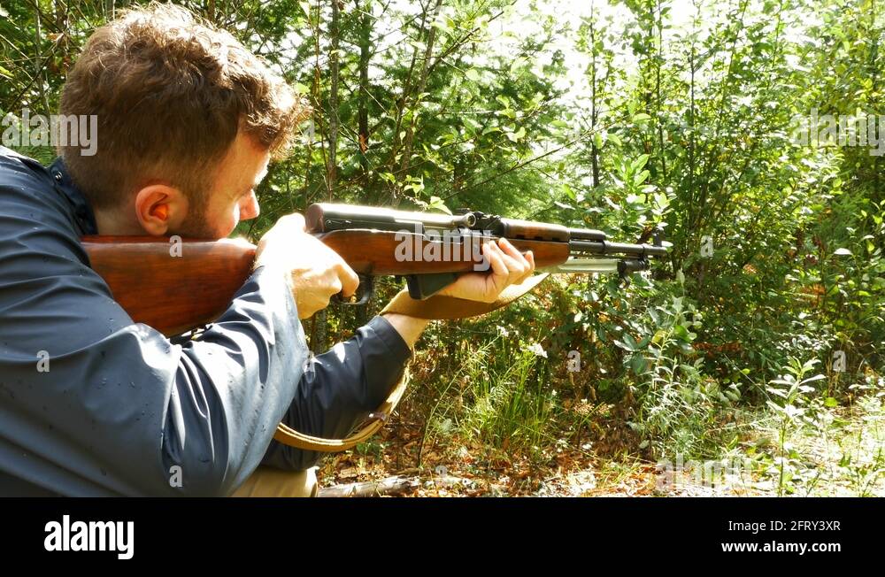 4K Man Shooting Rifle down range, Target Practice Sport Stock Video