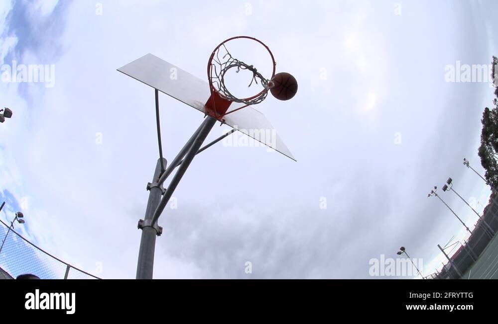 Basketball missing the hoop and bouncing off the rim, super slow motion Stock Video Footage Alamy