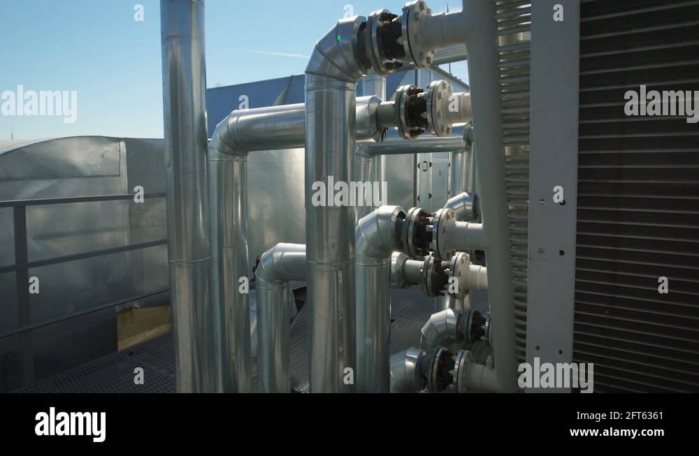 Metal chrome pipes are connected to a common water supply system for