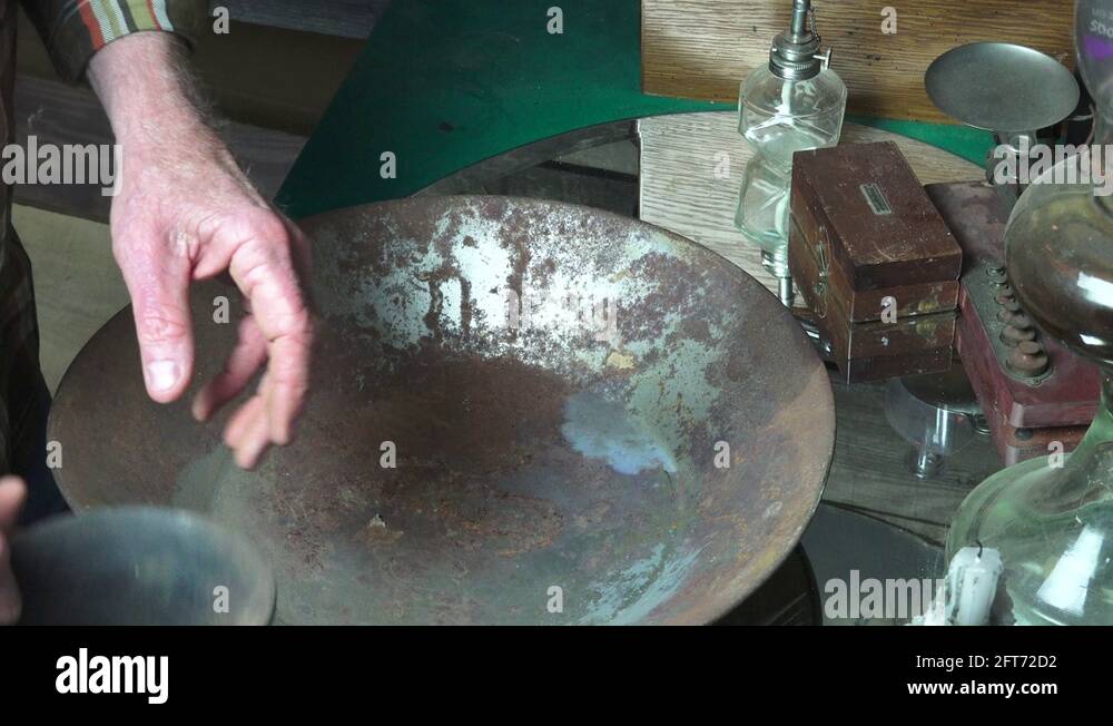 Gold mining, balls of mercury Stock Video Footage Alamy