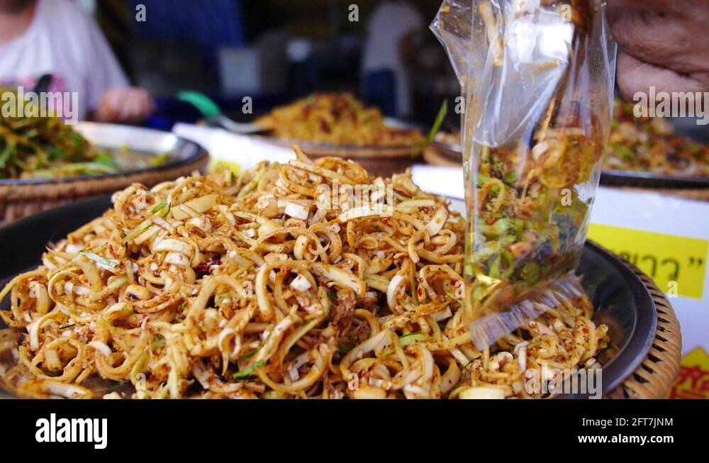 Spicy Street Food Takeaway at Thai Market. Closeup Stock Video Footage
