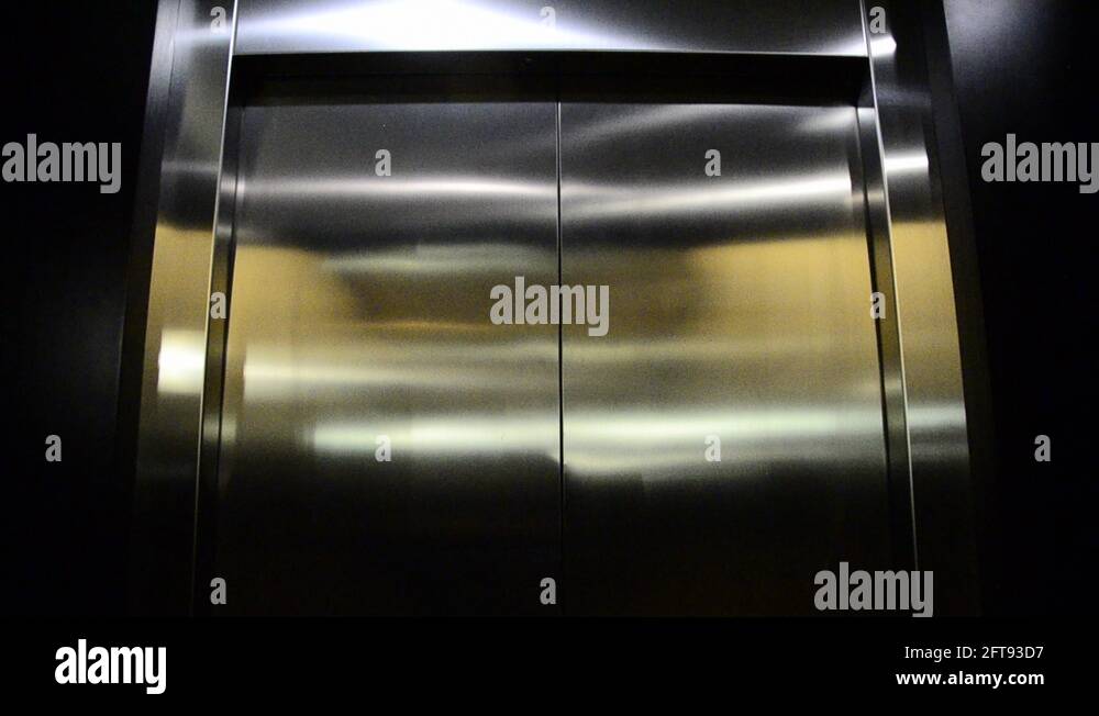Elevator doors opening and closing Stock Video Footage Alamy