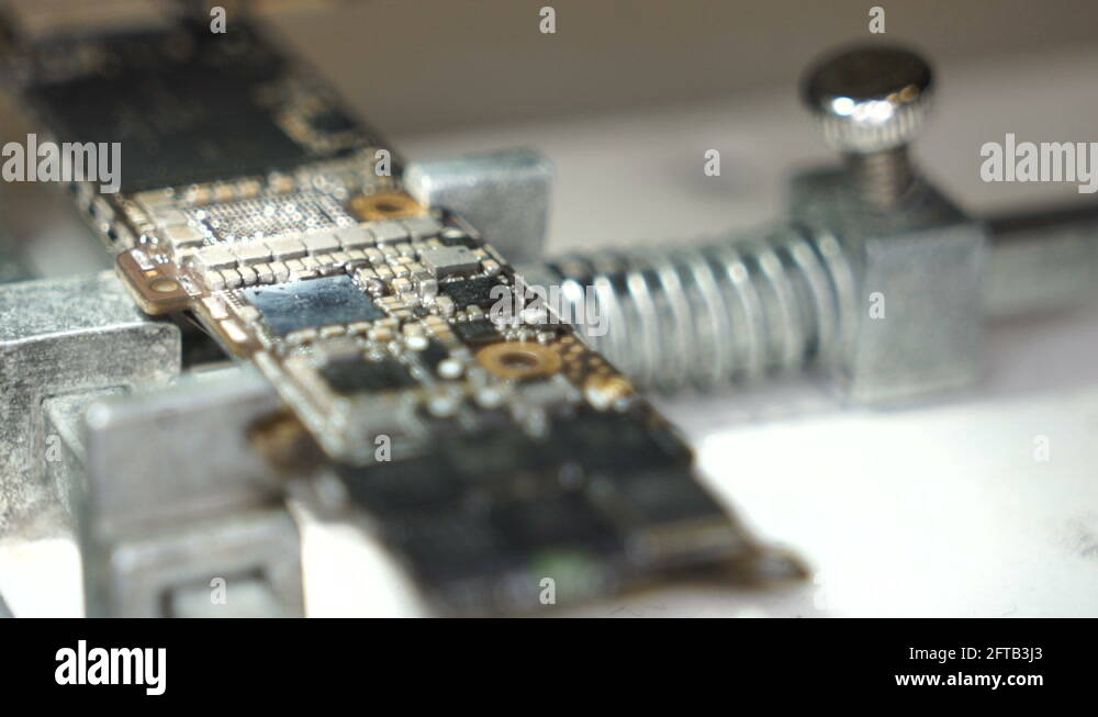 Soldering microchip on a chip Stock Video Footage Alamy