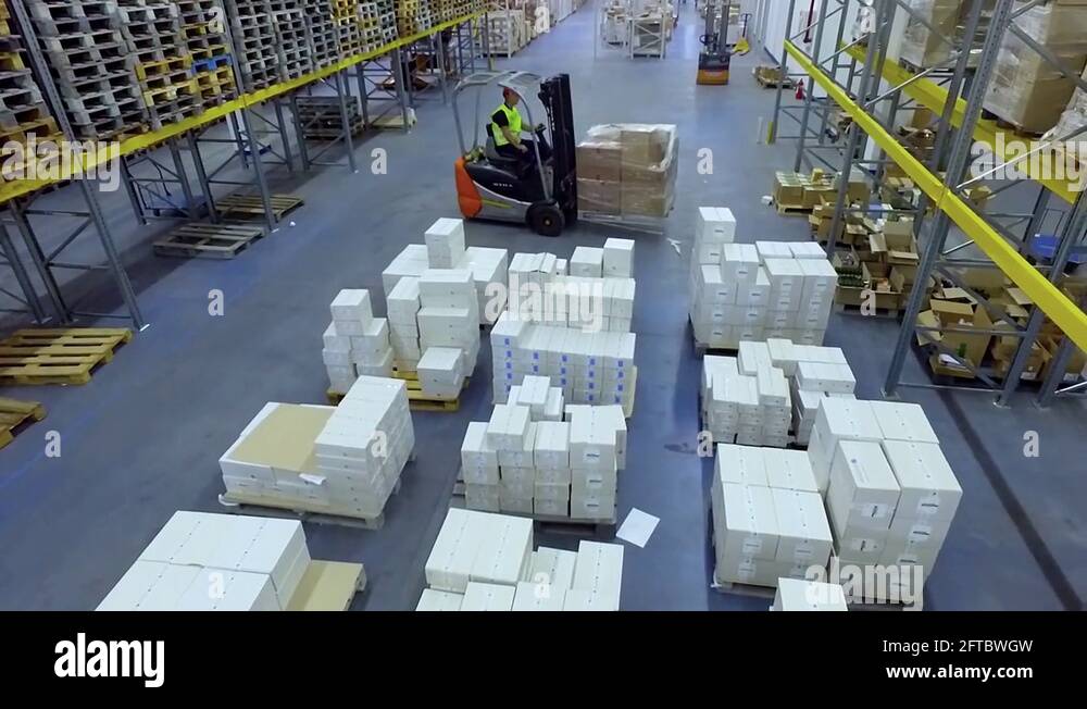 Warehouse Rear Unloading Forklift unload Stock Videos & Footage - HD and 4K Video Clips - Alamy