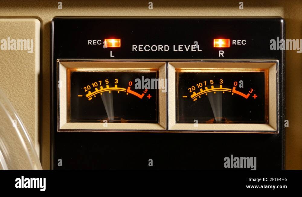 Analog vu meter of a vintage tape recorder machine while recording