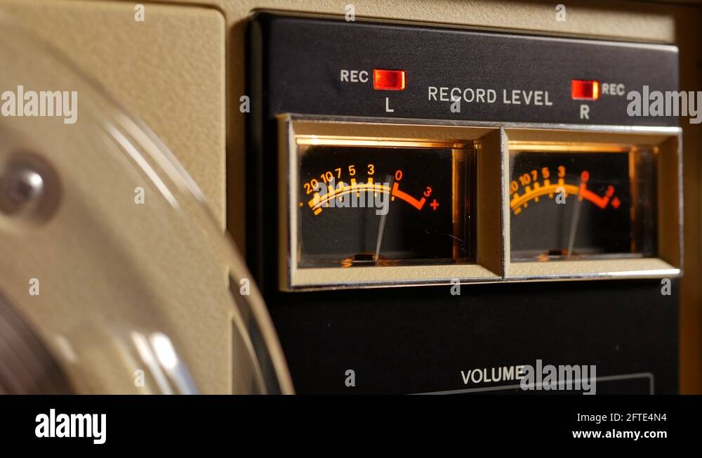 Analog vu meter of a vintage tape recorder machine while recording