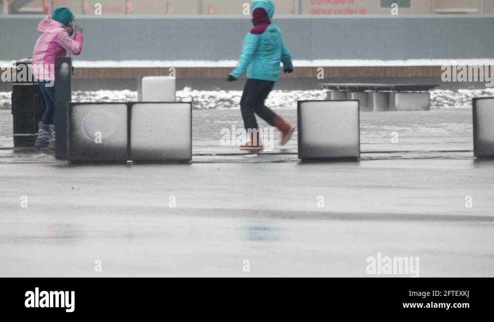 Women in heavy wind rain Stock Videos & Footage - HD and 4K Video Clips ...
