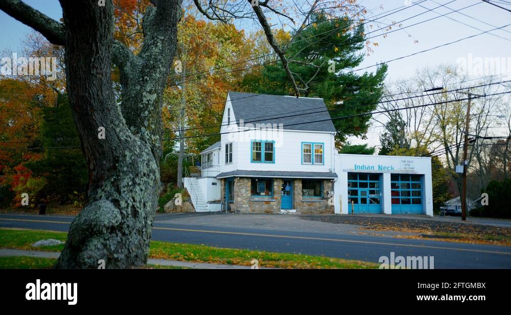 Old run down gas station for sale in Branford, Connecticut Stock Video