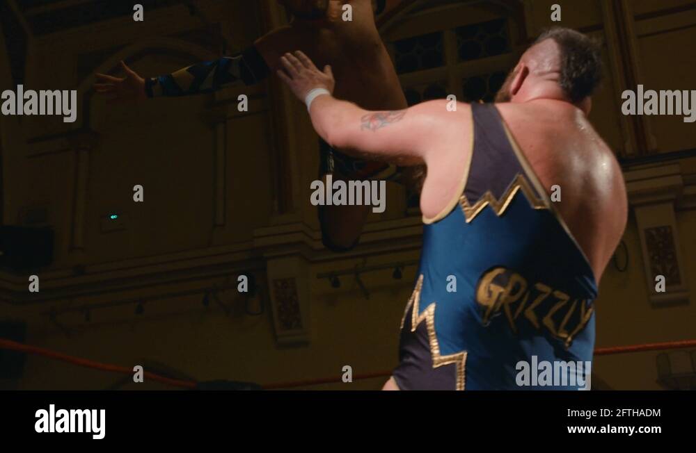 Wrestler Dives off Top Rope with Splash in Ring During Pro Wrestling ...