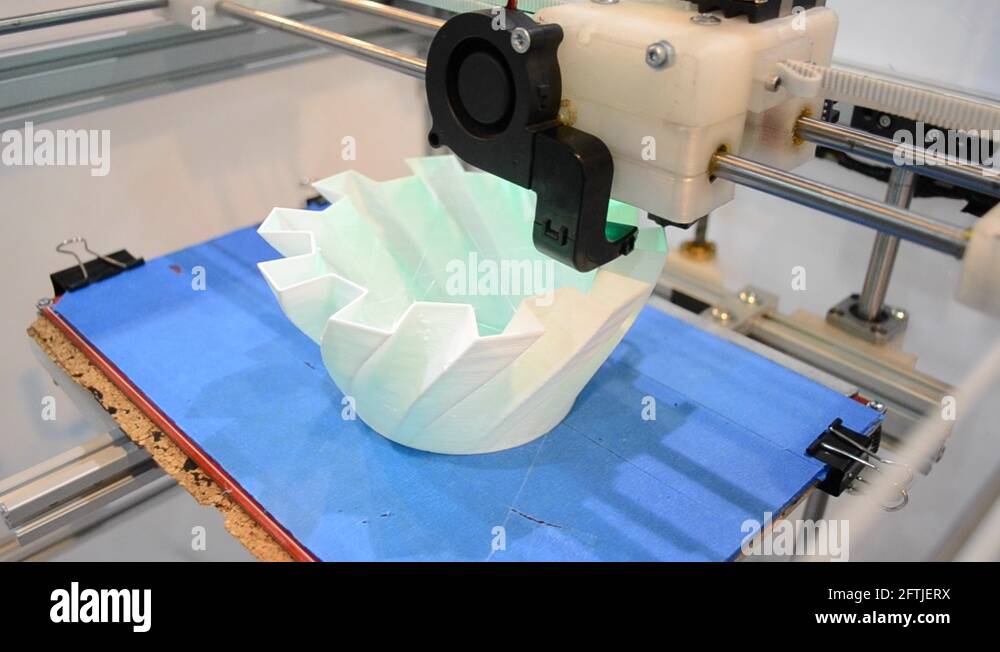 Volumatic Printer Printing on a 3D printer of a volumetric shape object of a close-up ...