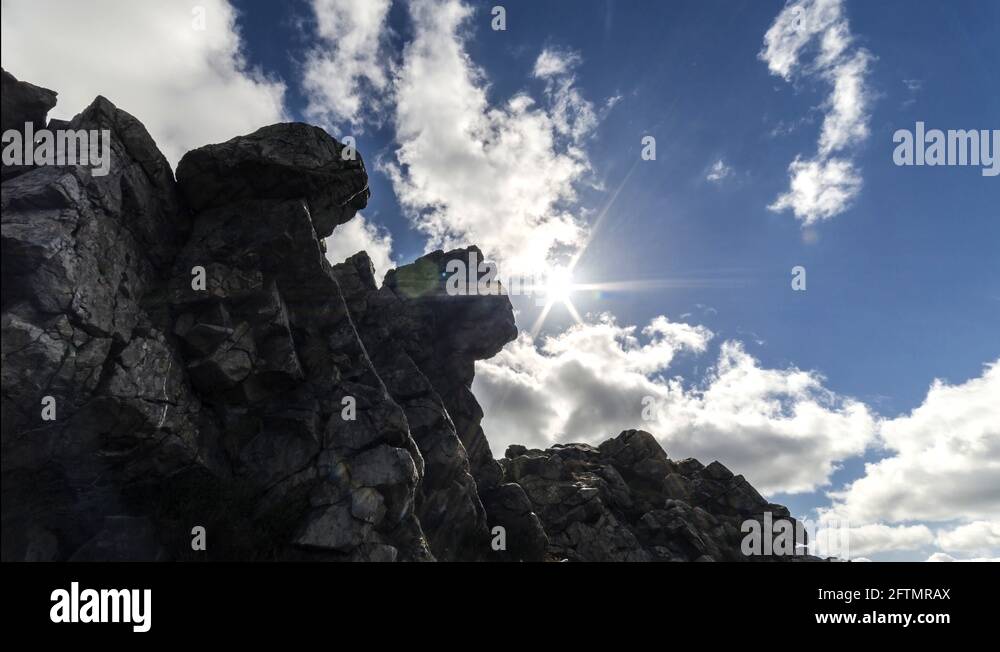 Sun over rocks Stock Videos & Footage - HD and 4K Video Clips - Alamy